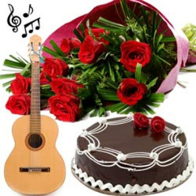 GUITARIST (ONLY ENGLISH SONGS) + 15 RED ROSES WRAPPED BEAUTIFULLY IN A HAND WOVEN SHEET + HALF KG CAKE AT MIDNIGHT ONLY ANYWHERE IN PUNE
