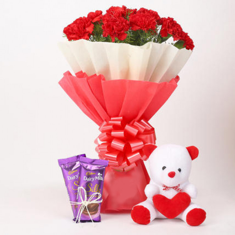 12 Red Carnations with Dairy Milk Silk & Teddy Bear